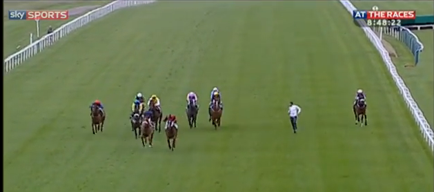 Video: Watch how an Absolute Idiot runs onto a track to race horses. 